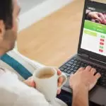 Man on sportsbook computer review